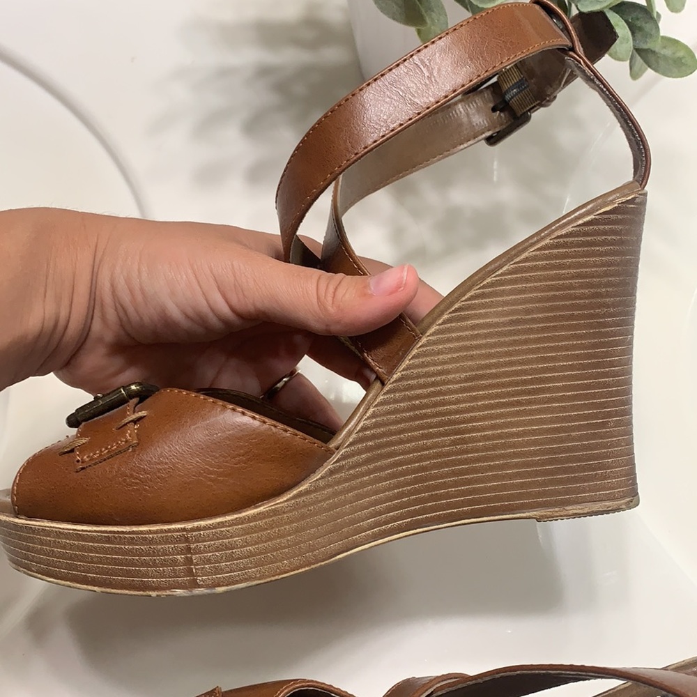 Brown wedge buckle heels